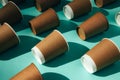 A paper cups on a blue background. Eco friendly pattern, zero waste concept Royalty Free Stock Photo
