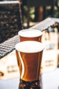 Paper cups with coffee in an outdoor cafe