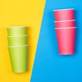 Paper cups on the Yellow and blue background