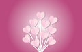 Bunch of pink hearts on sticks against a pink background. Ideal for Valentine\'s Day, love, and romantic themes. Royalty Free Stock Photo