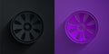 Paper cut Alloy wheel for car icon isolated on black on purple background. Paper art style. Vector