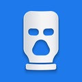 Paper cut Balaclava icon isolated on blue background. A piece of clothing for winter sports or a mask for a criminal or a thief.