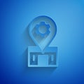 Paper cut Bicycle repair service icon isolated on blue background. Paper art style. Vector Royalty Free Stock Photo