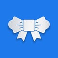 Paper cut Bow tie icon isolated on blue background. Paper art style. Vector Royalty Free Stock Photo