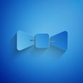 Paper cut Bow tie icon isolated on blue background. Paper art style. Vector Royalty Free Stock Photo