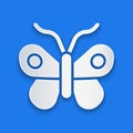 Paper cut Butterfly icon isolated on blue background. Paper art style. Vector Royalty Free Stock Photo