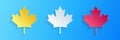 Paper cut Canadian maple leaf icon isolated on blue background. Canada symbol maple leaf. Paper art style. Vector Royalty Free Stock Photo