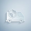 Paper cut Car with shield icon isolated on grey background. Insurance concept. Security, safety, protection, protect Royalty Free Stock Photo