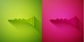 Paper cut Clarinet icon isolated on green and pink background. Musical instrument. Paper art style. Vector