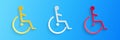 Paper cut Disabled handicap icon isolated on blue background. Wheelchair handicap sign. Paper art style. Vector Royalty Free Stock Photo