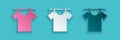 Paper cut Drying clothes icon isolated on blue background. Clean shirt. Wash clothes on a rope with clothespins Royalty Free Stock Photo