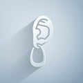 Paper cut Ear with earring icon isolated on grey background. Piercing. Auricle. Organ of hearing. Paper art style