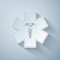 Paper cut Emergency star - medical symbol Caduceus snake with stick icon isolated on grey background. Star of Life Royalty Free Stock Photo