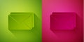 Paper cut Envelope icon isolated on green and pink background. Email message letter symbol. Paper art style. Vector Royalty Free Stock Photo