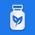 Paper cut Fertilizer bottle icon isolated on blue background. Paper art style. Vector