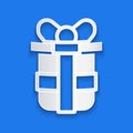 Paper cut Gift box icon isolated on blue background. Happy Birthday. Paper art style. Vector Royalty Free Stock Photo