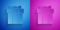 Paper cut Gift box icon isolated on blue and purple background. Valentines day. Paper art style. Vector Royalty Free Stock Photo