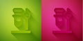 Paper cut Glass test tube flask on stand icon isolated on green and pink background. Laboratory equipment. Paper art Royalty Free Stock Photo