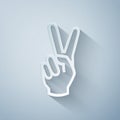 Paper cut Hand showing two finger icon isolated on grey background. Victory hand sign. Paper art style Royalty Free Stock Photo