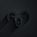 Paper cut Head of goat or ram icon isolated on black background. Mountain sheep. Animal symbol. Paper art style. Vector Royalty Free Stock Photo