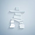 Paper cut Inukshuk icon isolated on grey background. Paper art style. Vector