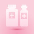 Paper cut Medicine bottle icon isolated on pink background. Bottle pill sign. Pharmacy design. Paper art style. Vector Royalty Free Stock Photo