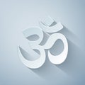 Paper cut Om or Aum Indian sacred sound icon isolated on grey background. Symbol of Buddhism and Hinduism religions. The Royalty Free Stock Photo