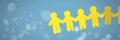 Paper cut out people holding hands together in line Royalty Free Stock Photo