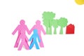 Paper cut outs representing a family with trees and house over white background