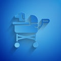 Paper cut Pet stroller icon isolated on blue background. Paper art style. Vector Royalty Free Stock Photo