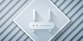 Paper cut Router and wi-fi signal icon isolated on grey background. Wireless ethernet modem router. Computer technology