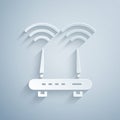 Paper cut Router and wi-fi signal icon isolated on grey background. Wireless ethernet modem router. Computer technology