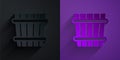 Paper cut Sauna bucket icon isolated on black on purple background. Paper art style. Vector