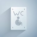 Paper cut Separated toilet for disabled persons icon isolated on grey background. Handicapped accessible male and female