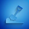 Paper cut Shovel in the ground icon isolated on blue background. Gardening tool. Tool for horticulture, agriculture Royalty Free Stock Photo