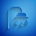 Paper cut Shower head with water drops flowing icon isolated on blue background. Paper art style. Vector Illustration Royalty Free Stock Photo