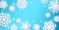 Paper cut snowflakes background. Winter holiday wallpaper with origami element of falling snow on blue, Christmas and Royalty Free Stock Photo