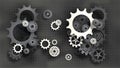 Paper cut style black and white gears and cogs on gray blueprint chalkboard background