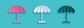 Paper cut Sun protective umbrella for beach icon isolated on blue background. Large parasol for outdoor space. Beach Royalty Free Stock Photo