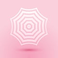 Paper cut Sun protective umbrella fo beach icon isolated on pink background. Large parasol for outdoor space. Summer Royalty Free Stock Photo