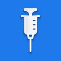 Paper cut Syringe icon isolated on blue background. Syringe for vaccine, vaccination, injection, flu shot. Medical Royalty Free Stock Photo