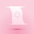 Paper cut Torah scroll icon isolated on pink background. Jewish Torah in expanded form. Torah Book. Star of David symbol