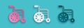 Paper cut Wheelchair for disabled person icon isolated on blue background. Paper art style. Vector Royalty Free Stock Photo