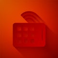 Paper cut Wireless tablet icon isolated on red background. Internet of things concept with wireless connection. Paper Royalty Free Stock Photo