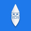 Paper cut Wizard warlock icon isolated on blue background. Paper art style. Vector