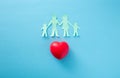 Paper cutout of family (father, mother, son and daughter). Life insurance concept Royalty Free Stock Photo