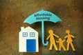 Affordable Housing family umbrella Royalty Free Stock Photo