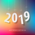 Paper 2019 digits on a rainbow bokeh background.