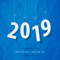 Paper 2019 digits white on a crumpled paper blue background. Royalty Free Stock Photo