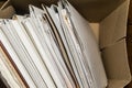 Paper documents stacked in archive. Old folders with documents in the box. office files background texture, closeup Royalty Free Stock Photo